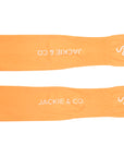 Orange UV protective arm sleeves featuring thumb holes, with 'Jackie&Co' written in white along the forearm and a line art horse logo on the top of the hand.